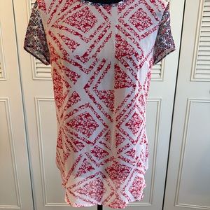 Cabi xs  top in red ,white ,and blue with small cap sleeve. Great condition.j23